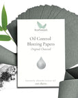 Oil control blotting papers with packaging on a white background