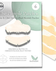 Pimple patches packaging with visible patches on a white background